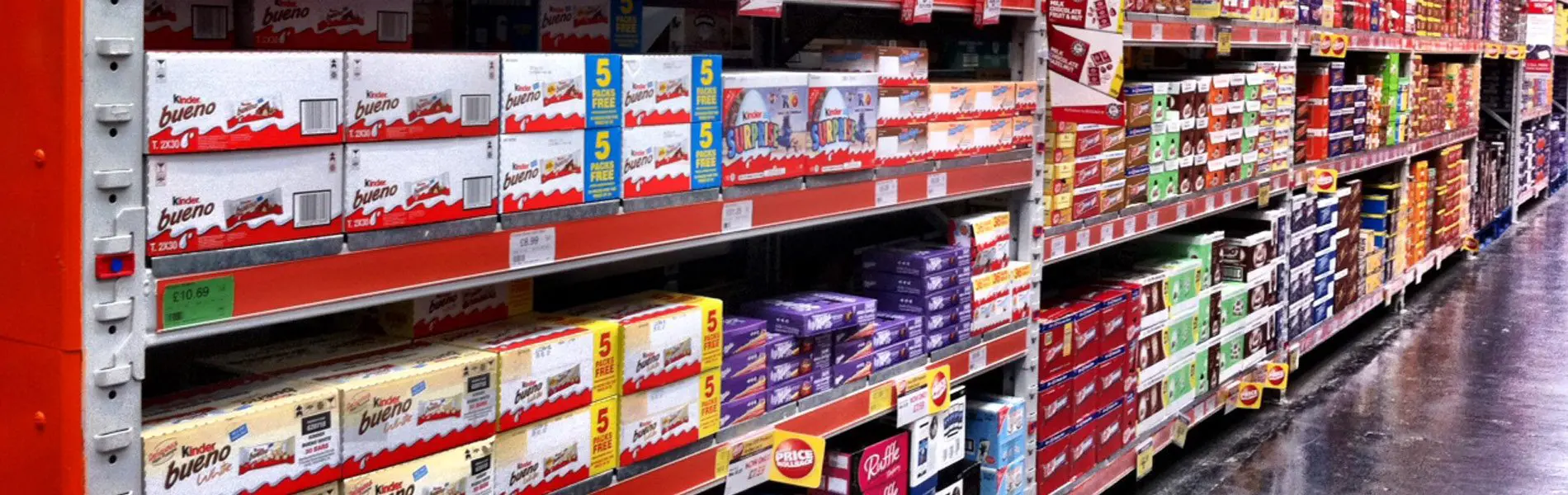 A shop interior displaying an aisle of Makro products.