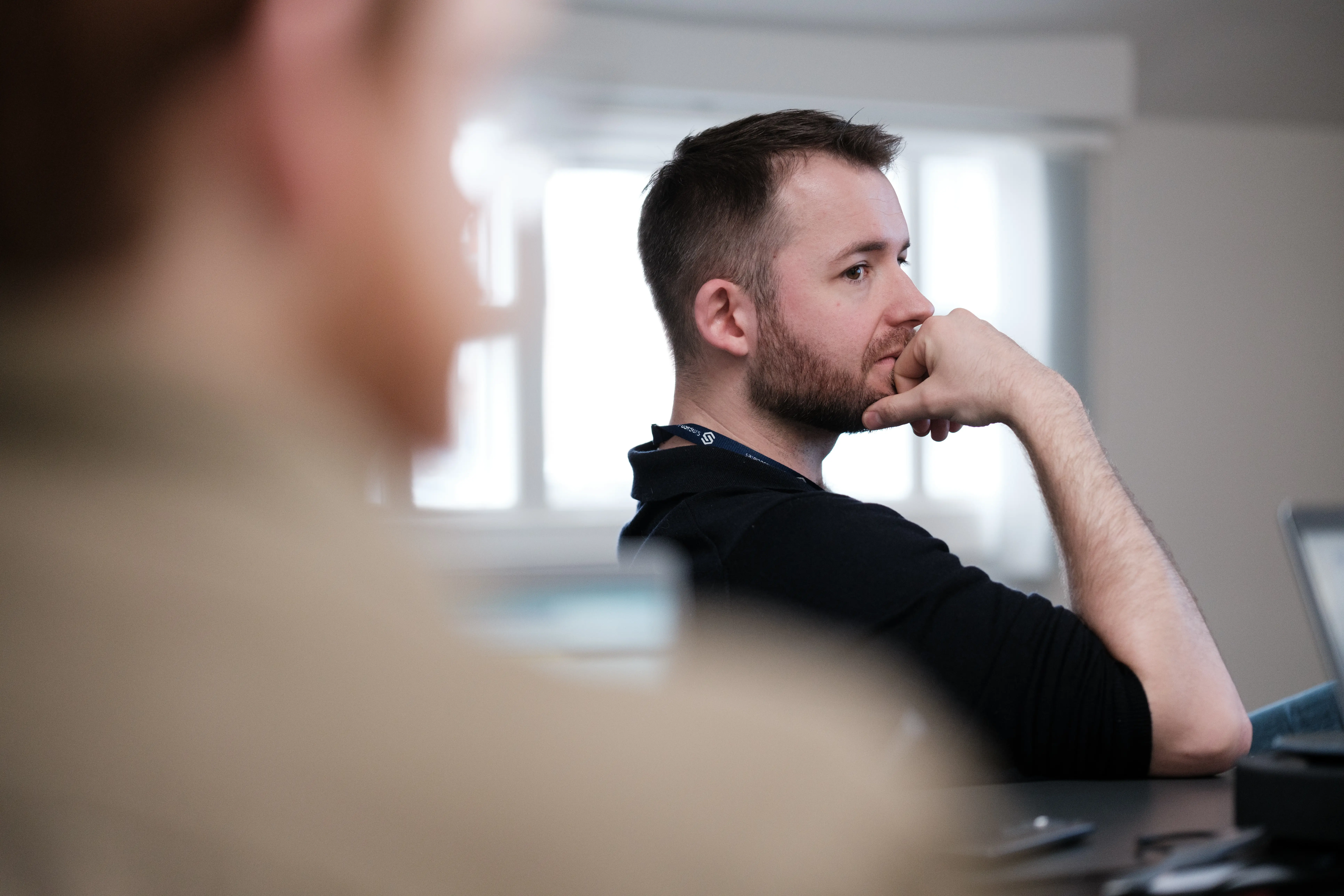 team talking in a meeting room.